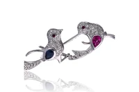 Spilla con diamanti, rubini e zaffiri - Asta Speciale San Valentino