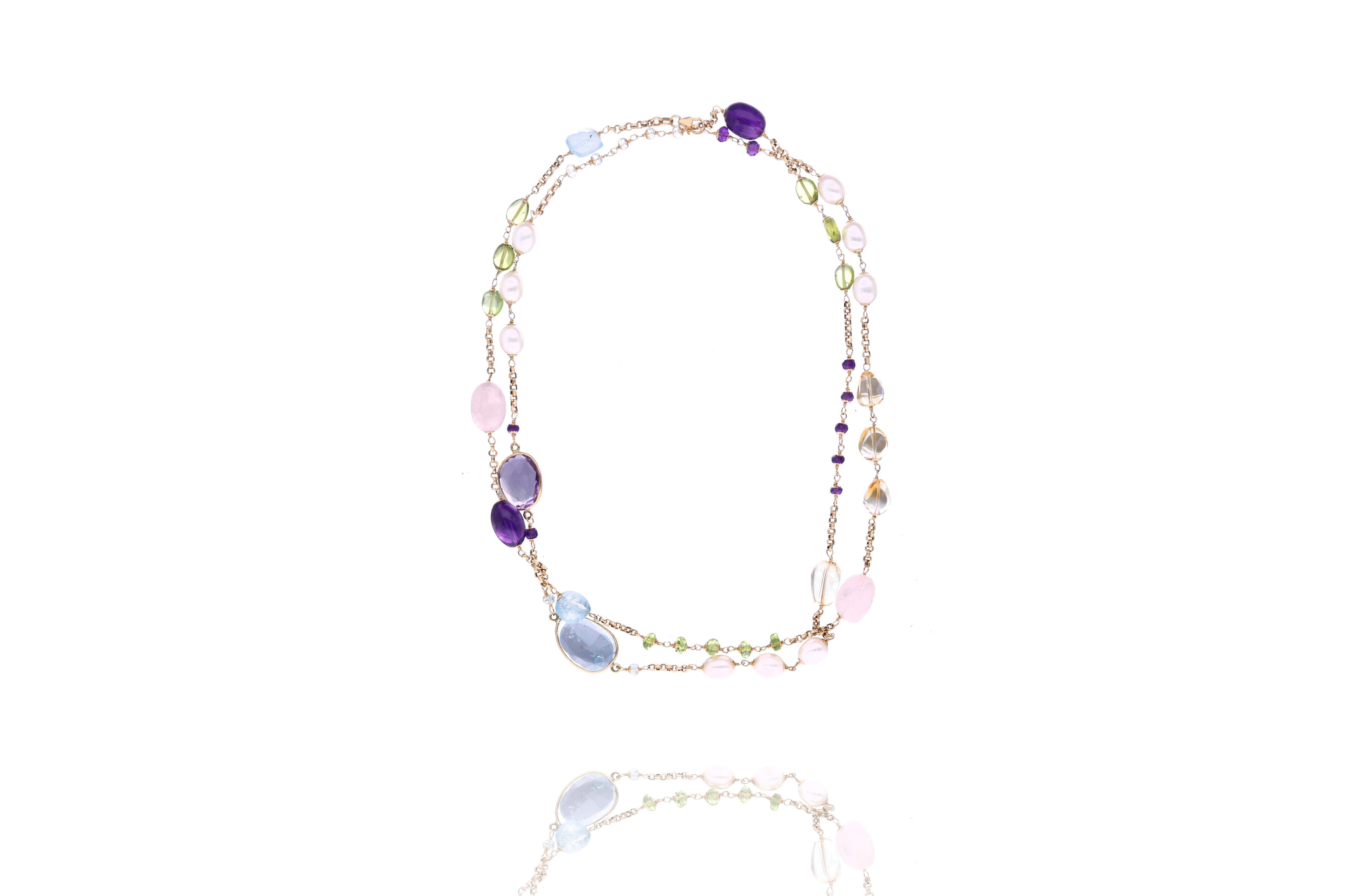 Collana con acquemarine, peridoti, quarzi e perle di fiume - Asta Speciale San Valentino Collana con acquemarine, peridoti, quarzi e perle di fiume - Asta Speciale San Valentino