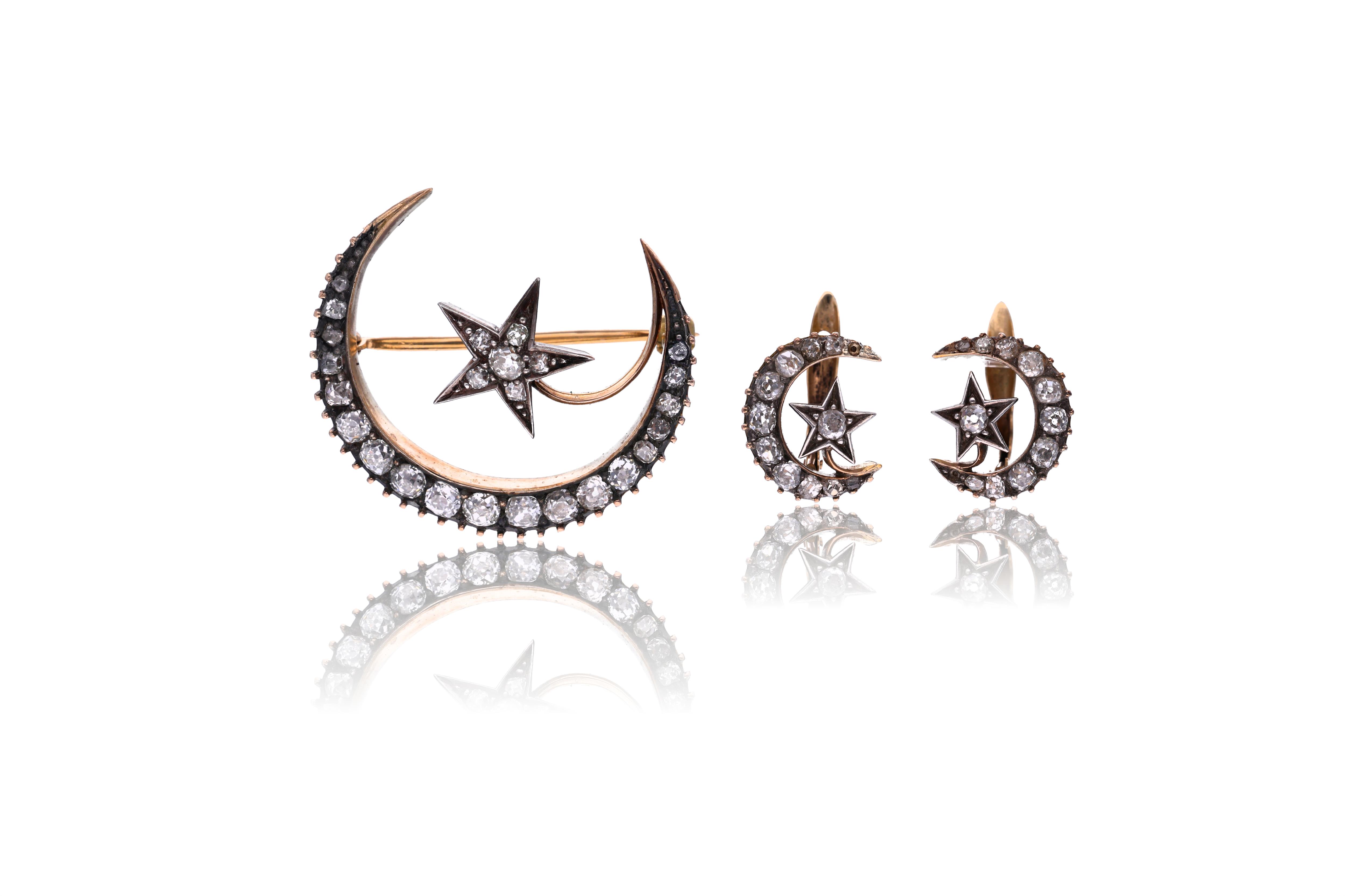 Spilla e paio di orecchini con diamanti - Asta Speciale San Valentino